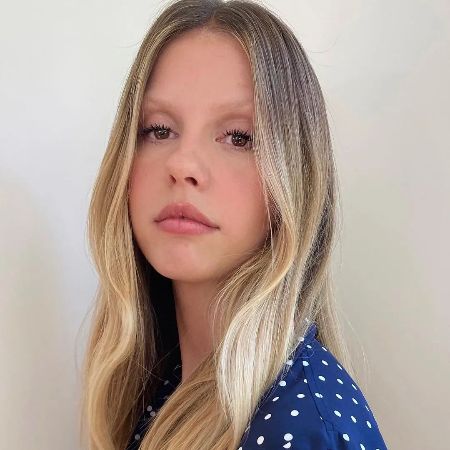 Mia Goth stands at five feet and ten inches with natural blonde hair and eyebrows.